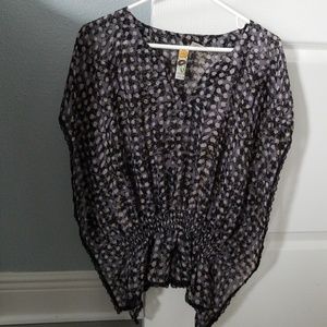 Sheer flowy black & gray blouse with tan dots.